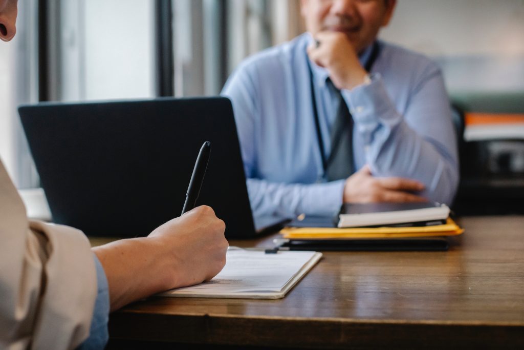 Person filling out paperwork