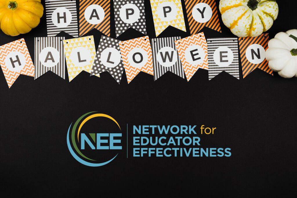 Photo of sign reading Happy Halloween with NEE logo incorporated